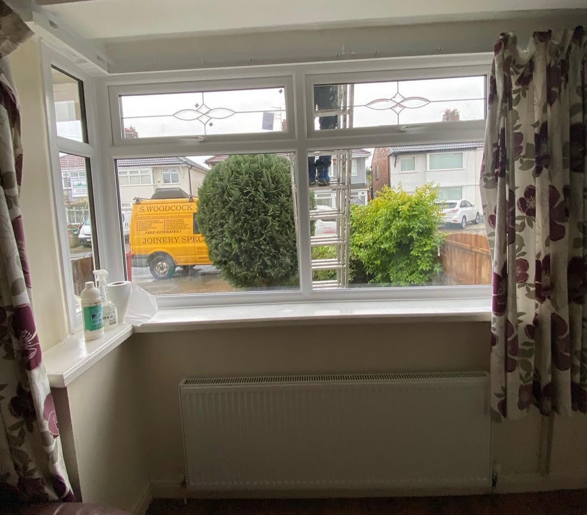 Newly installed white bay window with leaded light detail, Liverpool