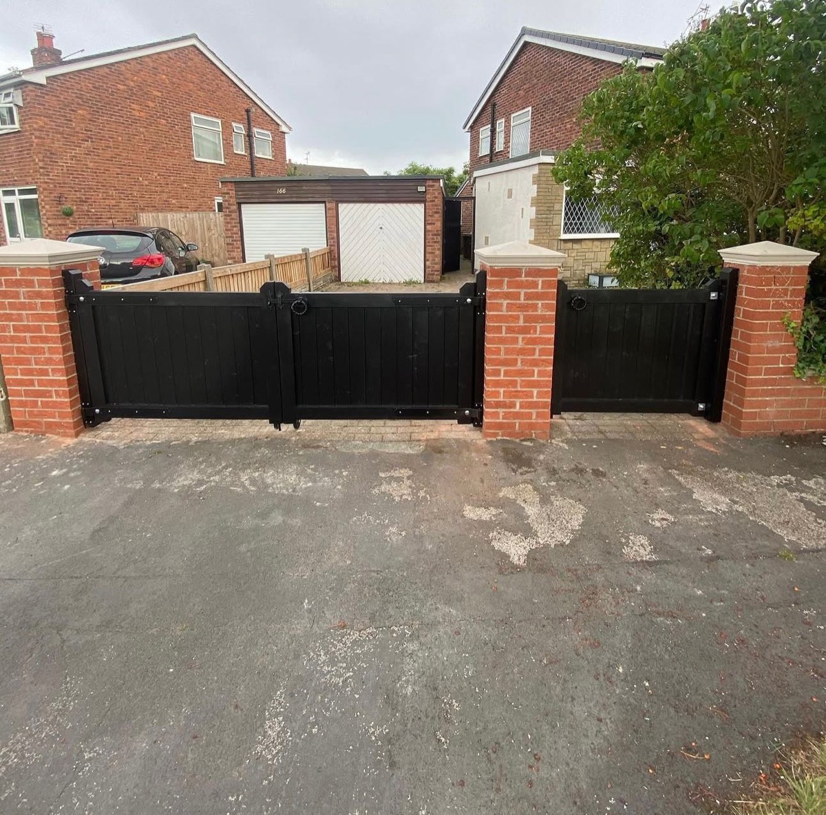 Black timber double driveway gates with pedestrian side gate, Liverpool