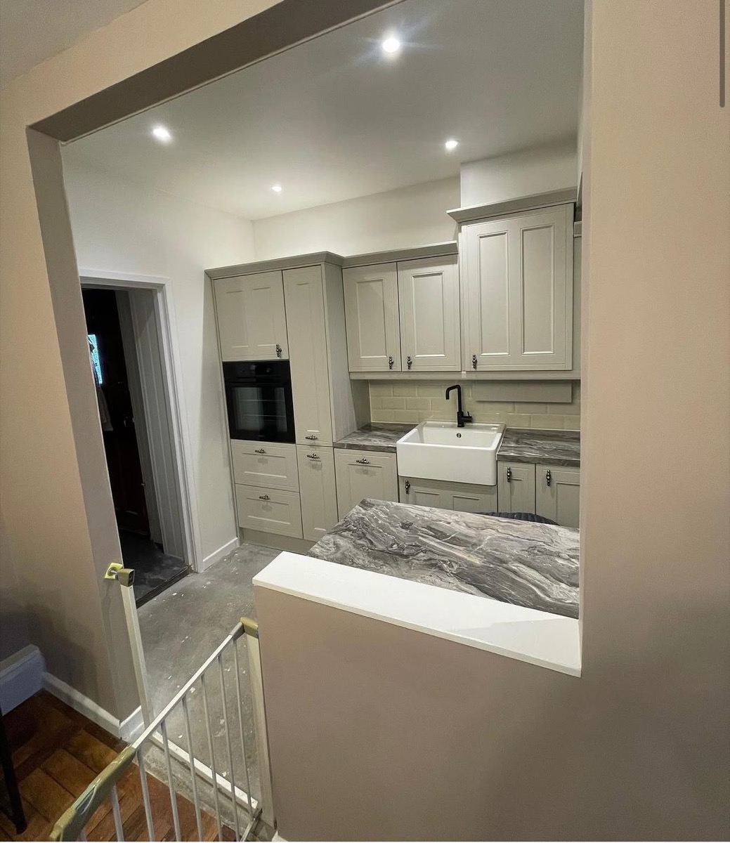 Handmade grey shaker kitchen through archway with Belfast sink, Liverpool