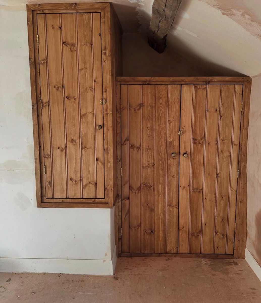 Pine fitted wardrobes under sloping ceiling, bespoke joinery Liverpool