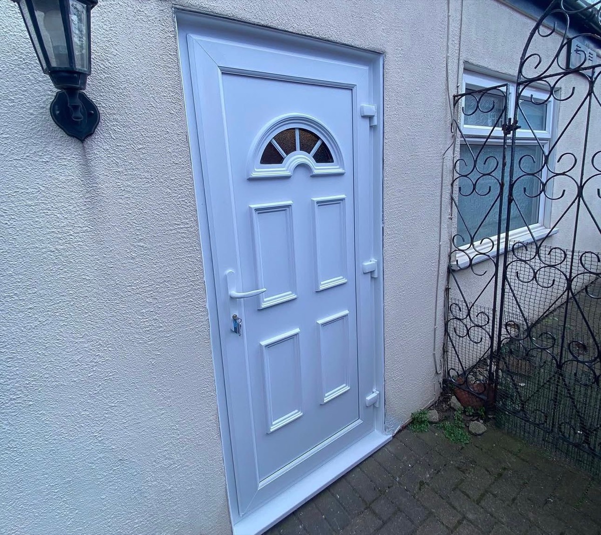 White painted panelled front door with arched fanlight, Liverpool