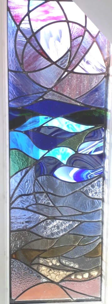 Abstract Art Nouveau seascape stained glass panel with blue and teal glass