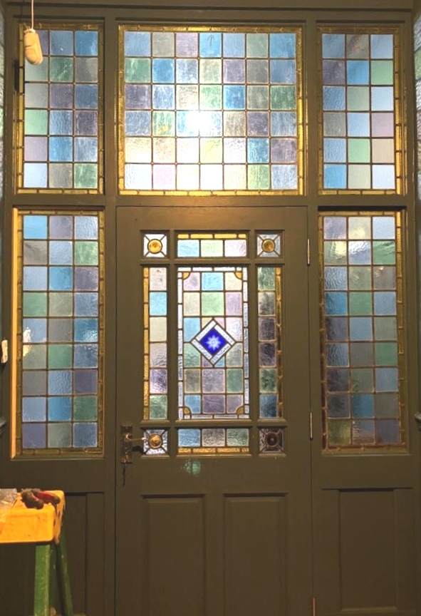 Victorian front door with full-height coloured leaded light panels